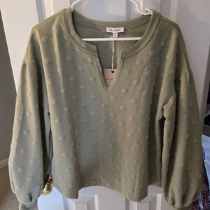 Green polkadot shirt